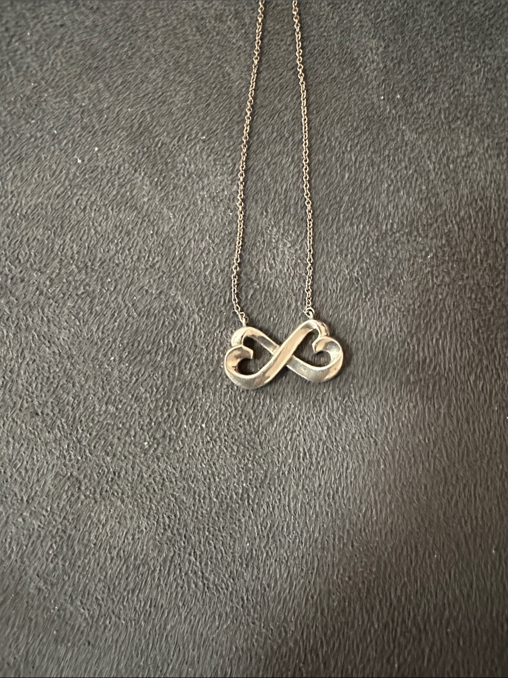 Tiffany & Co. Silver Infinity Heart Necklace PREOWNED.